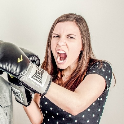 woman punching (400x400)